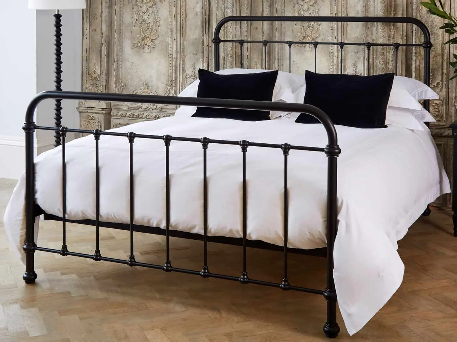 Black-painted metal bed frame