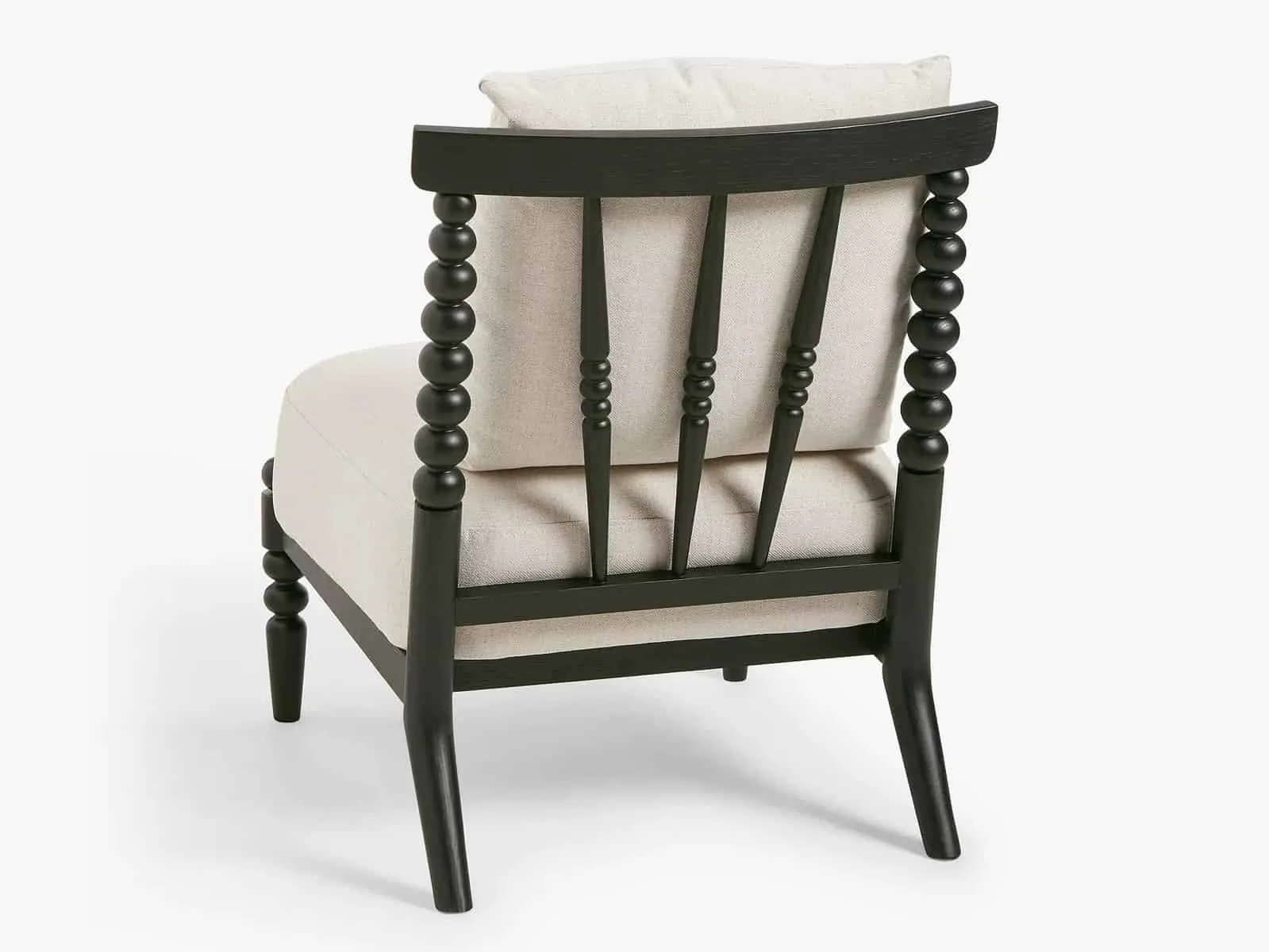 Black painted wooden frame chair with neutral coloured cushions