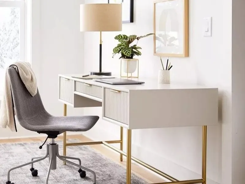 White home office desk with 3 textured drawer fronts and gold-coloured legs