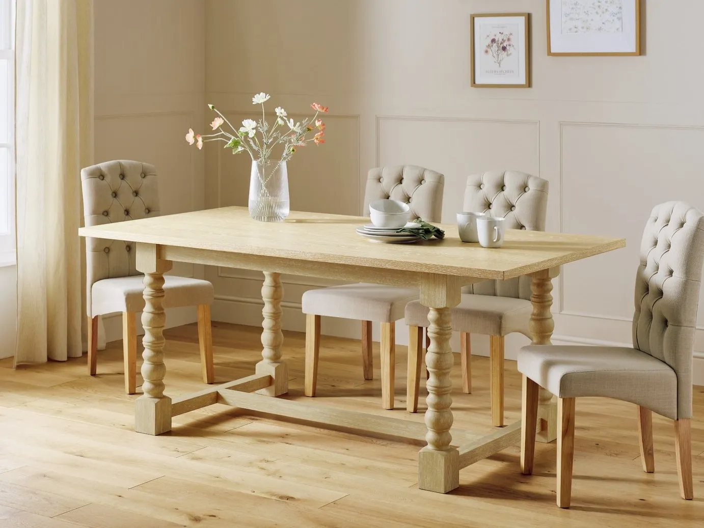 Turned leg dining table and grey fabric chairs