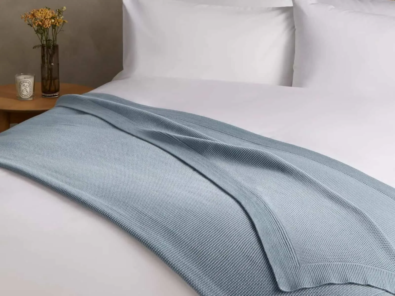 Knit throw on bed