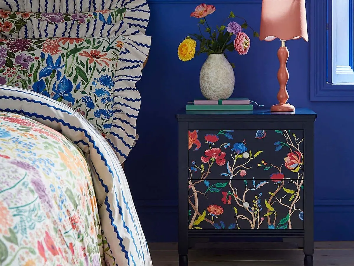 Painted bedside table with floral pattern design