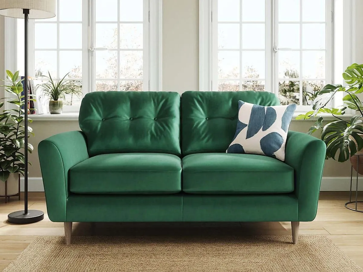 2-seater green velvet sofa