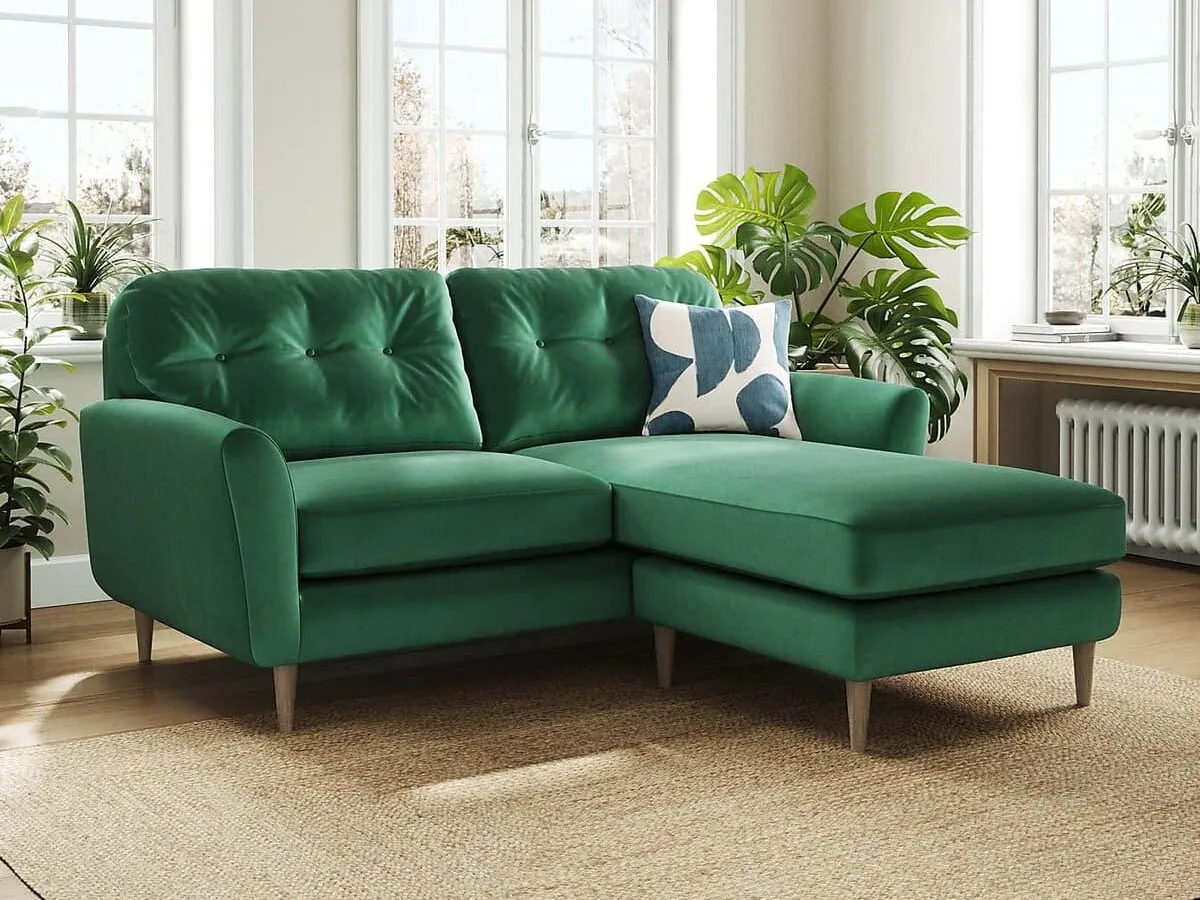 Green velvet corner sofa
