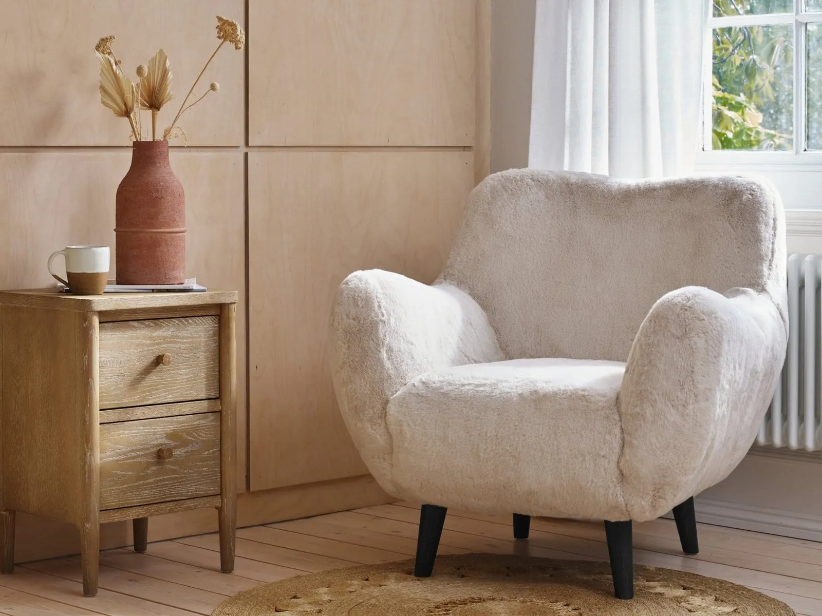 White fur upholstered armchair