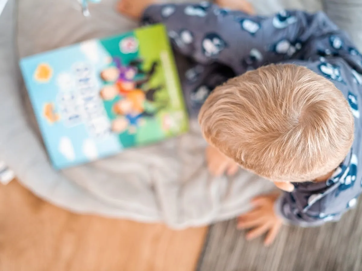 Child about to read a book