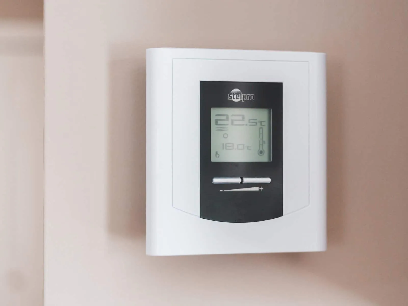 Wall-mounted heating control panel