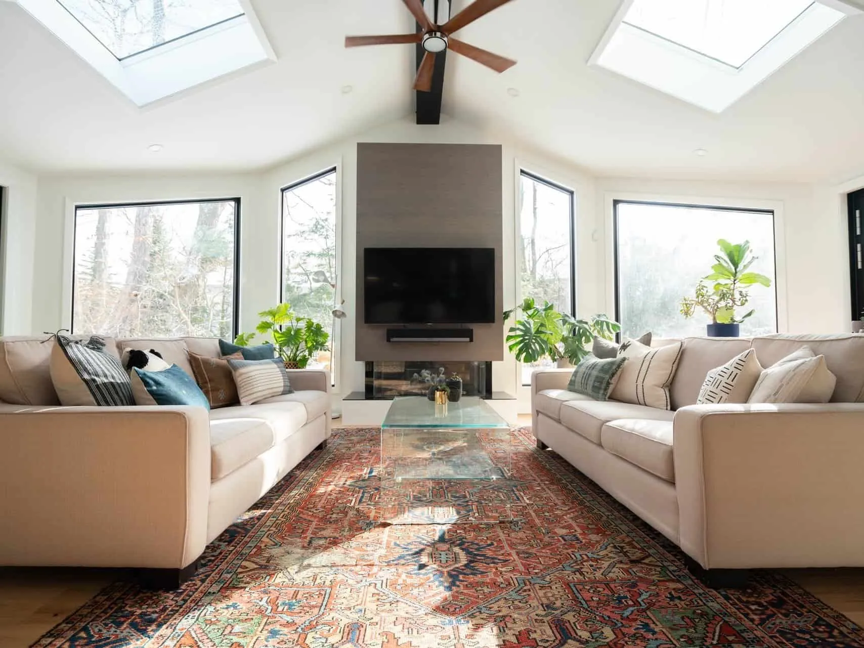 Wooden floor with central rug