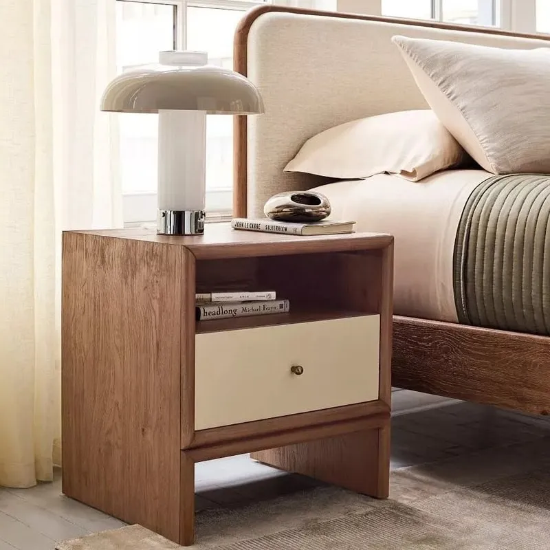 Oak bedside table with contracting cream-coloured single drawer